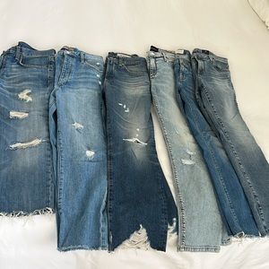Set of 6 pairs of jeans. All new or great used condition. Sizes 25-26 waist